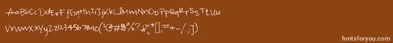 Czcionka Irisisweird – różowe czcionki na brązowym tle