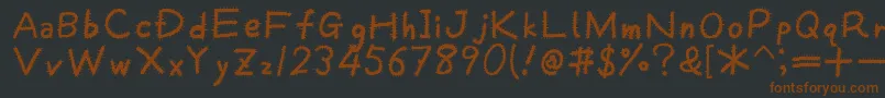 Шрифт Kemushi – коричневые шрифты на чёрном фоне