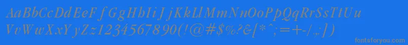 GaramondCondLightItalic-fontti – harmaat kirjasimet sinisellä taustalla