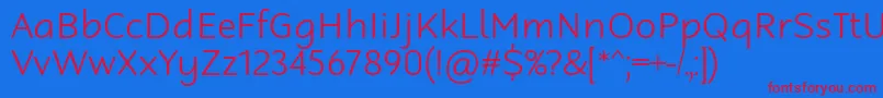 RobagaRoundedLight-Schriftart – Rote Schriften auf blauem Hintergrund