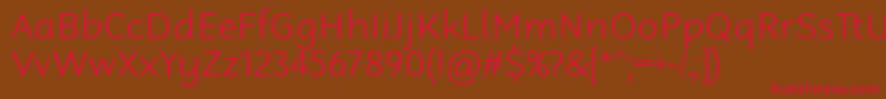フォントRobagaRoundedLight – 赤い文字が茶色の背景にあります。