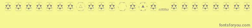 Police Pyramid – polices grises sur fond jaune