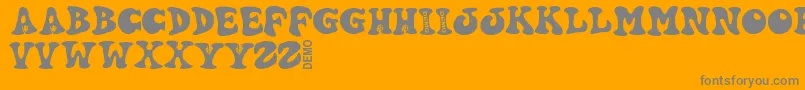 Hartydemo-Schriftart – Graue Schriften auf orangefarbenem Hintergrund