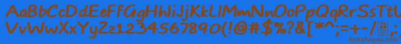 TypoComicsBoldDemo Font – Brown Fonts on Blue Background