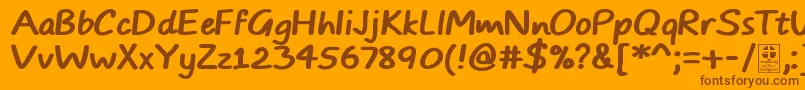 Czcionka TypoComicsBoldDemo – brązowe czcionki na pomarańczowym tle