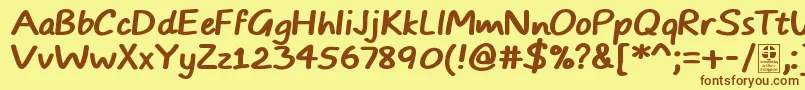 フォントTypoComicsBoldDemo – 茶色の文字が黄色の背景にあります。