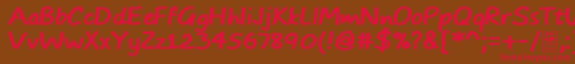 フォントTypoComicsBoldDemo – 赤い文字が茶色の背景にあります。