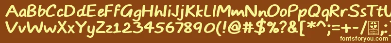 TypoComicsBoldDemo-Schriftart – Gelbe Schriften auf braunem Hintergrund