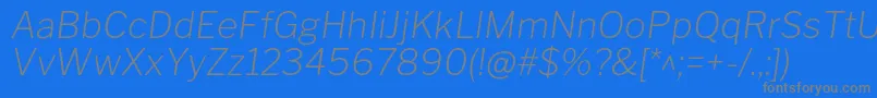 フォントLibrefranklinExtralightitalic – 青い背景に灰色の文字