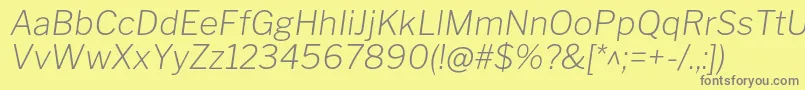 フォントLibrefranklinExtralightitalic – 黄色の背景に灰色の文字