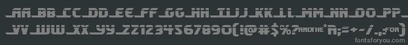 Shiningheraldlaser-fontti – harmaat kirjasimet mustalla taustalla