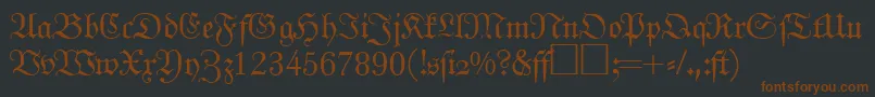 Шрифт JohannfrakturRegularDb – коричневые шрифты на чёрном фоне