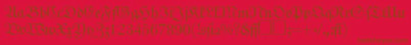 フォントJohannfrakturRegularDb – 赤い背景に茶色の文字