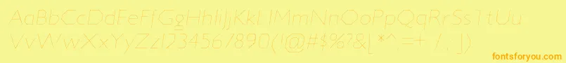 フォントJillicanulItalic – オレンジの文字が黄色の背景にあります。