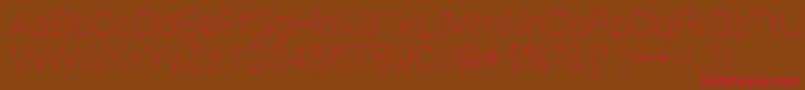VantaThinPlain-Schriftart – Rote Schriften auf braunem Hintergrund