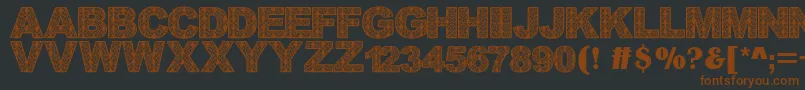 Batikdayakfont Font – Brown Fonts on Black Background