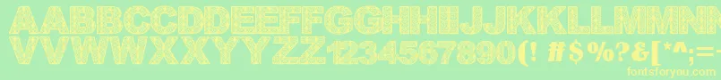 Batikdayakfont Font – Yellow Fonts on Green Background
