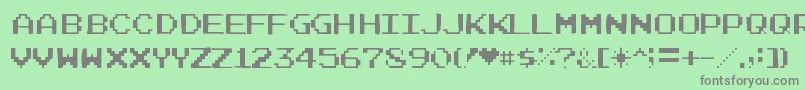 Joystixgaunt-fontti – harmaat kirjasimet vihreällä taustalla