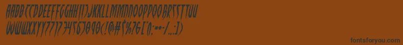 Inhumanityexpandital-Schriftart – Schwarze Schriften auf braunem Hintergrund