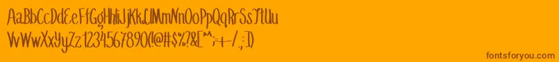 Fonte SummerflingMedium – fontes marrons em um fundo laranja