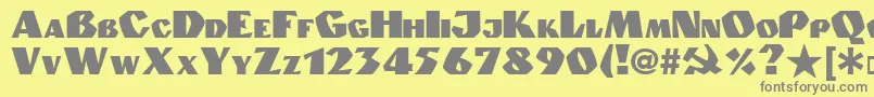 フォントGranit.Kz – 黄色の背景に灰色の文字