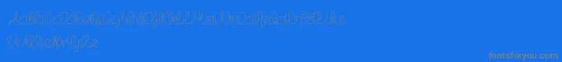 TheWizard-Schriftart – Graue Schriften auf blauem Hintergrund