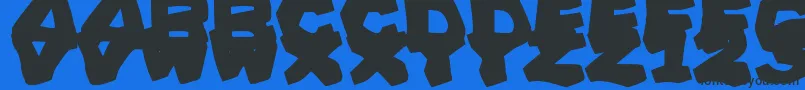 PrehistoricCaveman Font – Black Fonts on Blue Background