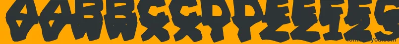 PrehistoricCaveman Font – Black Fonts on Orange Background