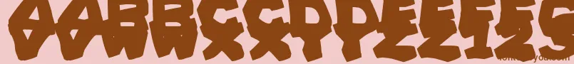 PrehistoricCaveman-Schriftart – Braune Schriften auf rosa Hintergrund