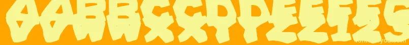 PrehistoricCaveman Font – Yellow Fonts on Orange Background