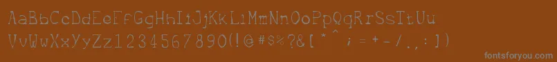 Шрифт Metrique – серые шрифты на коричневом фоне