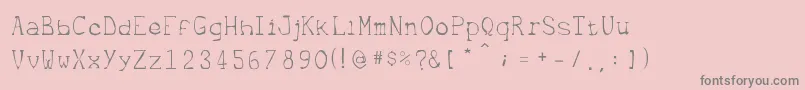 フォントMetrique – ピンクの背景に灰色の文字