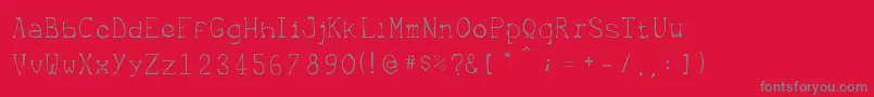 Metrique-fontti – harmaat kirjasimet punaisella taustalla