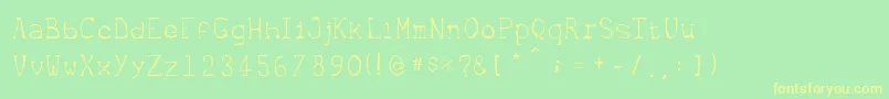 Metrique Font – Yellow Fonts on Green Background