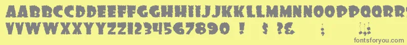 フォントDssonof – 黄色の背景に灰色の文字