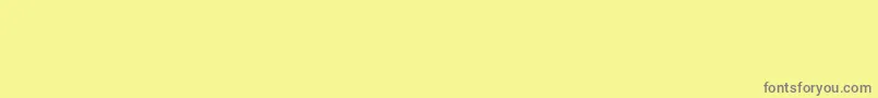PaintItGothRus-fontti – harmaat kirjasimet keltaisella taustalla