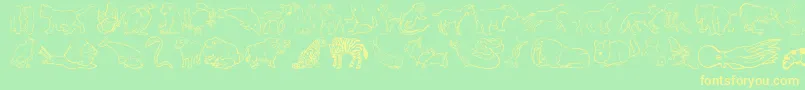 NinasAnimals Font – Yellow Fonts on Green Background