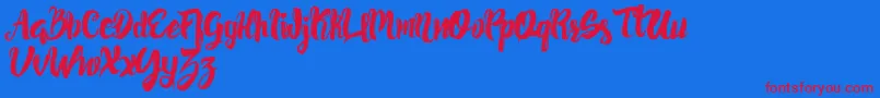 PancakesyrupRegular Font – Red Fonts on Blue Background