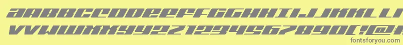 フォントMichiganexpandsuperital – 黄色の背景に灰色の文字