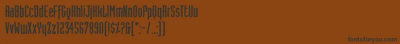 Шрифт IndustriaLtSolidA – чёрные шрифты на коричневом фоне