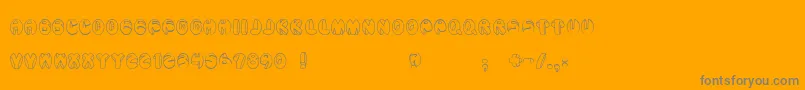 Aragon-fontti – harmaat kirjasimet oranssilla taustalla