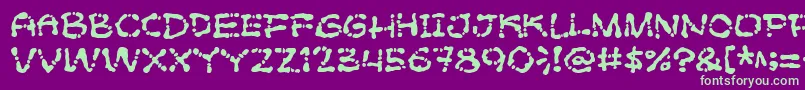 Poftsarade-Schriftart – Grüne Schriften auf violettem Hintergrund