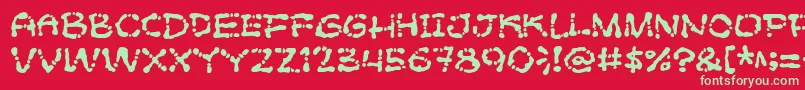 Poftsarade Font – Green Fonts on Red Background