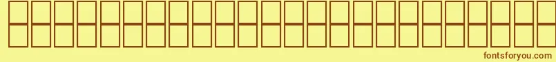 フォントAlKharashi65 – 茶色の文字が黄色の背景にあります。