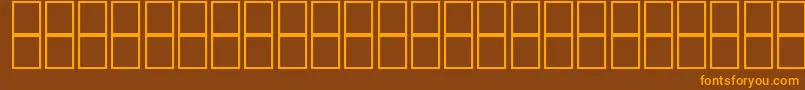 フォントAlKharashi65 – オレンジ色の文字が茶色の背景にあります。