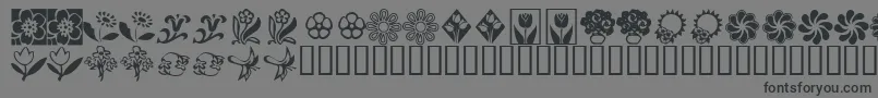 Fonte KrKatsFlowers2 – fontes pretas em um fundo cinza