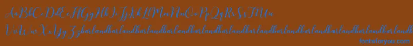 KissitaScriptDemo Font – Blue Fonts on Brown Background