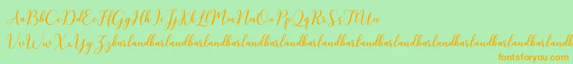 KissitaScriptDemo Font – Orange Fonts on Green Background