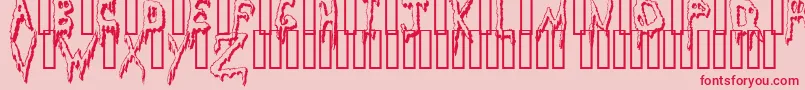 フォントGrossoutShadow – ピンクの背景に赤い文字