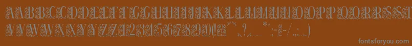 Remeslostd Font – Gray Fonts on Brown Background